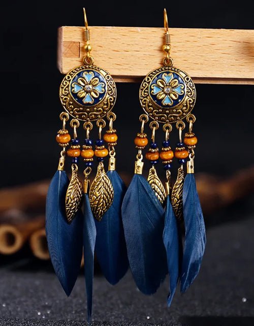 Load image into Gallery viewer, Bohemian Vintage Jewelry For Women 2024 Trendy Carved Leaf Feather Tassel Long Earrings