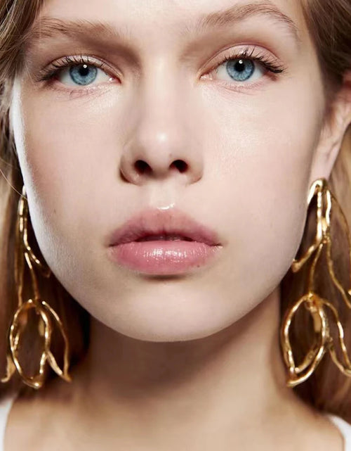 Load image into Gallery viewer, Modern Luxury Design Metal Geometric Flower Long Dangle Earrings For Women Trend Fashion Unique