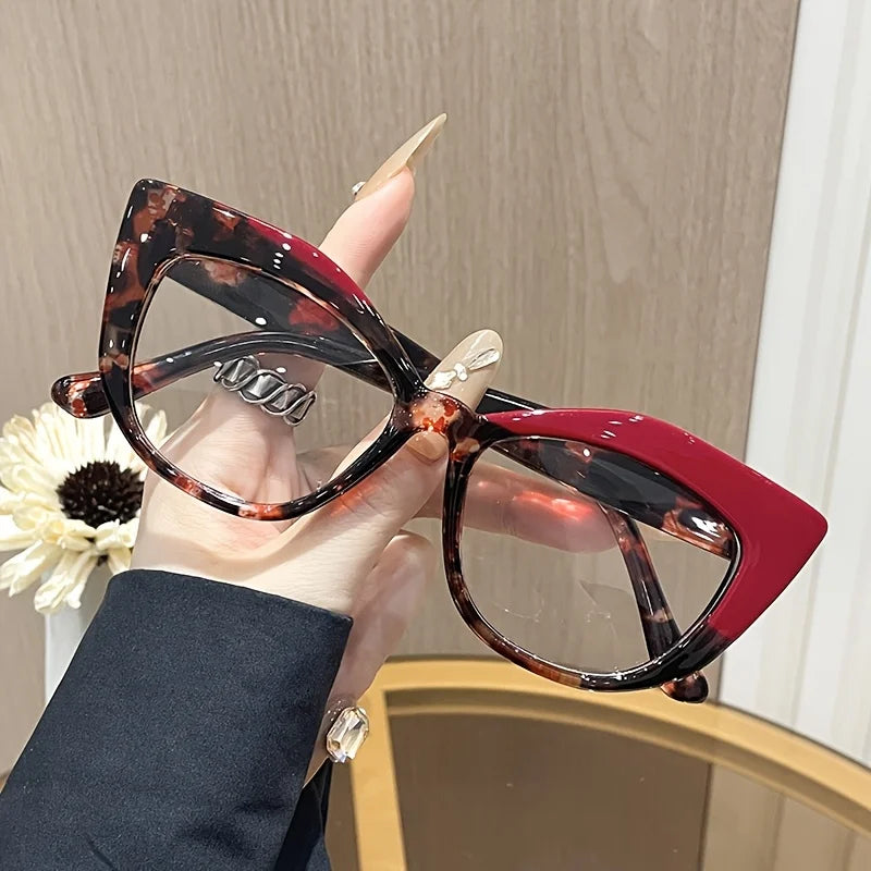 Stylish Cat-Eye Glasses with Unique Blue Light Blocking Features Retro-Style Eyewear Designed for Women with Color Block Pattern