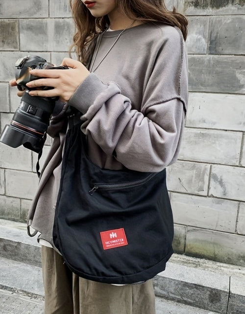 Load image into Gallery viewer, Large Capacity American Retro Nylon Multi-Functional Vest Bag - Sleeveless Workwear Convertible Backpack Vest - Outdoor Functional Two-In-One Tote Crossbody Coat Shopping Bag