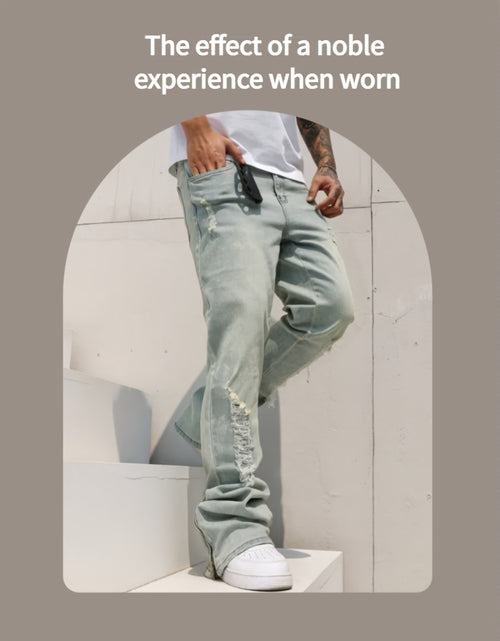 Load image into Gallery viewer, Men Slim-fit, Slightly Flared Jeans With Zippers At The Cuffs That Are Split, Made Of Elastic Denim With Cotton Fabric, And Featuring Heavy Washing With Holes. Classic, Stylish And Retro Blue Color, Fashionable And Versatile