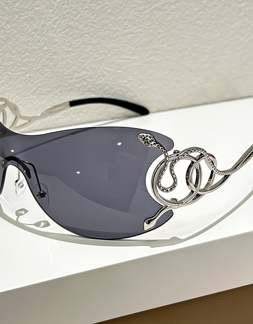 Load image into Gallery viewer, Y2K Style Frameless Glasses with Snake Design Hinges - Zinc Alloy, Clear PC Lenses, Futuristic Metallic Finish for Streetwear Fashion
