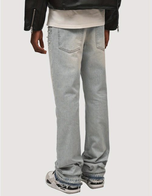 Load image into Gallery viewer, Men Slim-Fit Stretch Denim Jeans with Raw Hem &amp; Metallic Accents -  Light Blue &amp; Black, Comfortable &amp; Stylish for Casual Attire, Versatile Clothing, Trendy Streetwear, Durable Fabric
