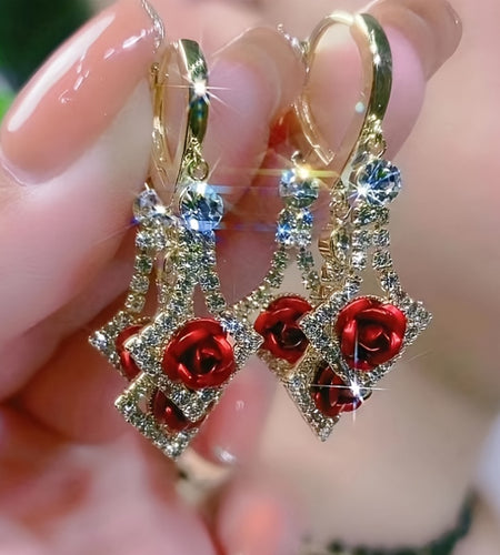 These Are Two Pairs of Rose Earrings in Different Colors. Rose Zirconia Is A Stylish and Elegant Red Earring