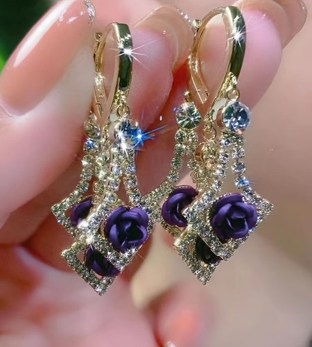 These Are Two Pairs of Rose Earrings in Different Colors. Rose Zirconia Is A Stylish and Elegant Red Earring