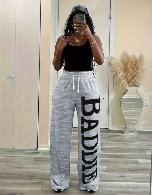 Load image into Gallery viewer, Plus Size, Women&#39;s Black &quot;Baddie&quot; Pants - Loose Fit Wide-Leg Trousers with Bold Letter Print, Adjustable Drawstring Waist, Machine Washable Polyester Blend
