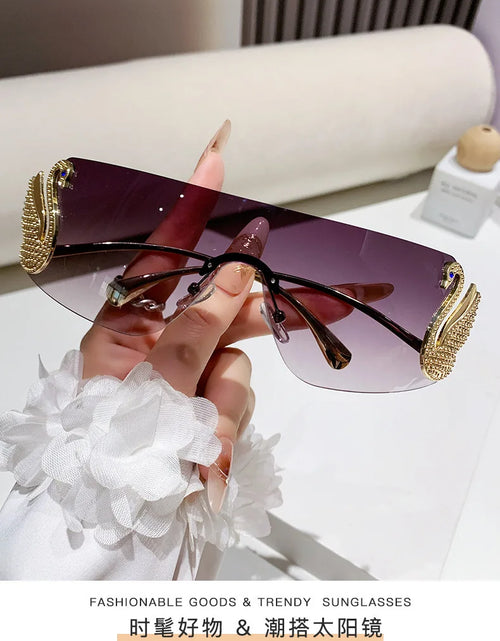 Load image into Gallery viewer, New Fashion Women Oversized Rimless Sunglasses Luxury Brand Swan Shaped Sun Glasses Trendy Large Frame Sun Glasses UV400
