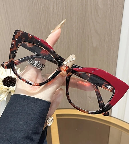 Stylish Cat-Eye Glasses with Unique Blue Light Blocking Features Retro-Style Eyewear Designed for Women with Color Block Pattern