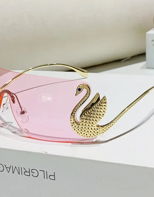 Load image into Gallery viewer, New Fashion Women Oversized Rimless Sunglasses Luxury Brand Swan Shaped Sun Glasses Trendy Large Frame Sun Glasses UV400
