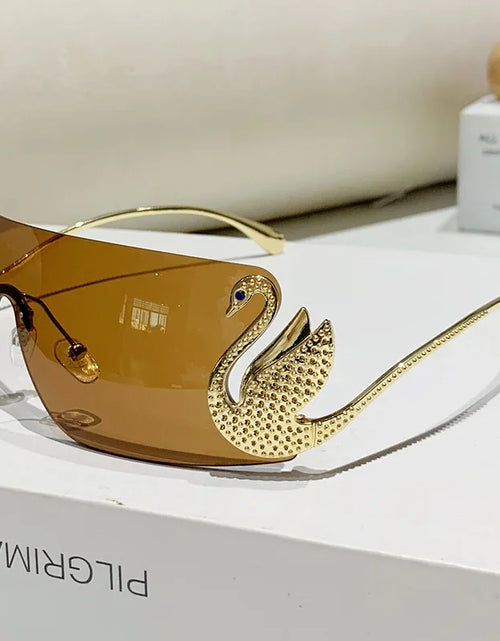 Load image into Gallery viewer, New Fashion Women Oversized Rimless Sunglasses Luxury Brand Swan Shaped Sun Glasses Trendy Large Frame Sun Glasses UV400

