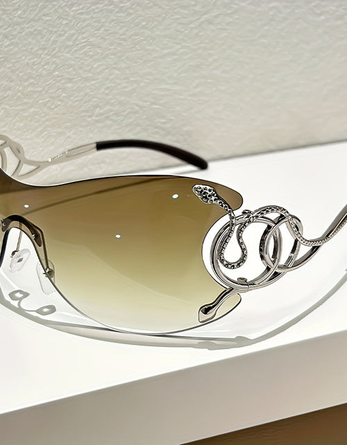 Load image into Gallery viewer, Y2K Style Frameless Glasses with Snake Design Hinges - Zinc Alloy, Clear PC Lenses, Futuristic Metallic Finish for Streetwear Fashion
